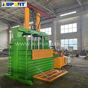 What are the environmental advantages of a vertical truck tires baler